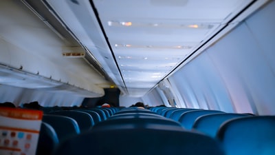 The blue and white plane seat
